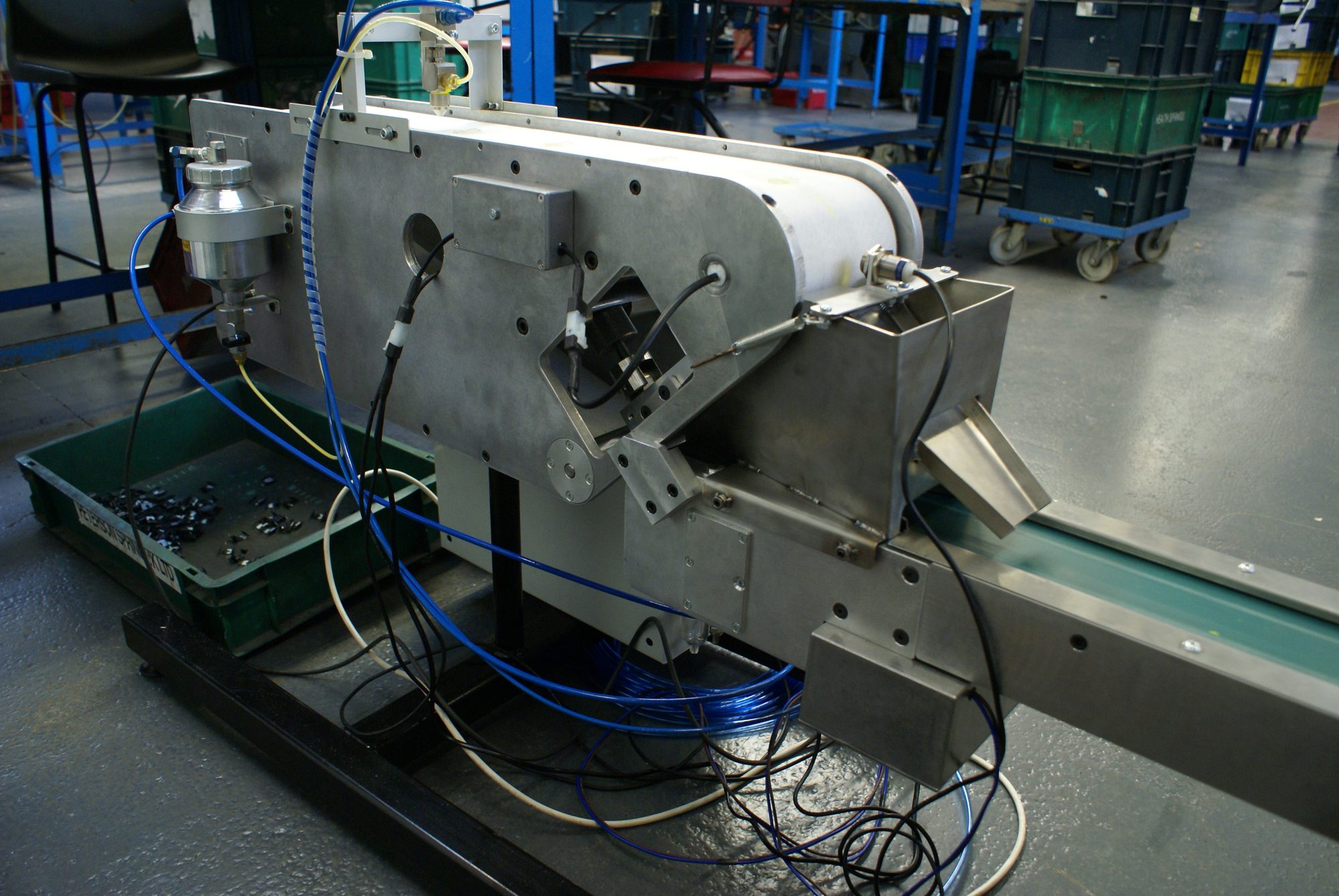 Industrial automation test rig with conveyor, sensors and pneumatic controls