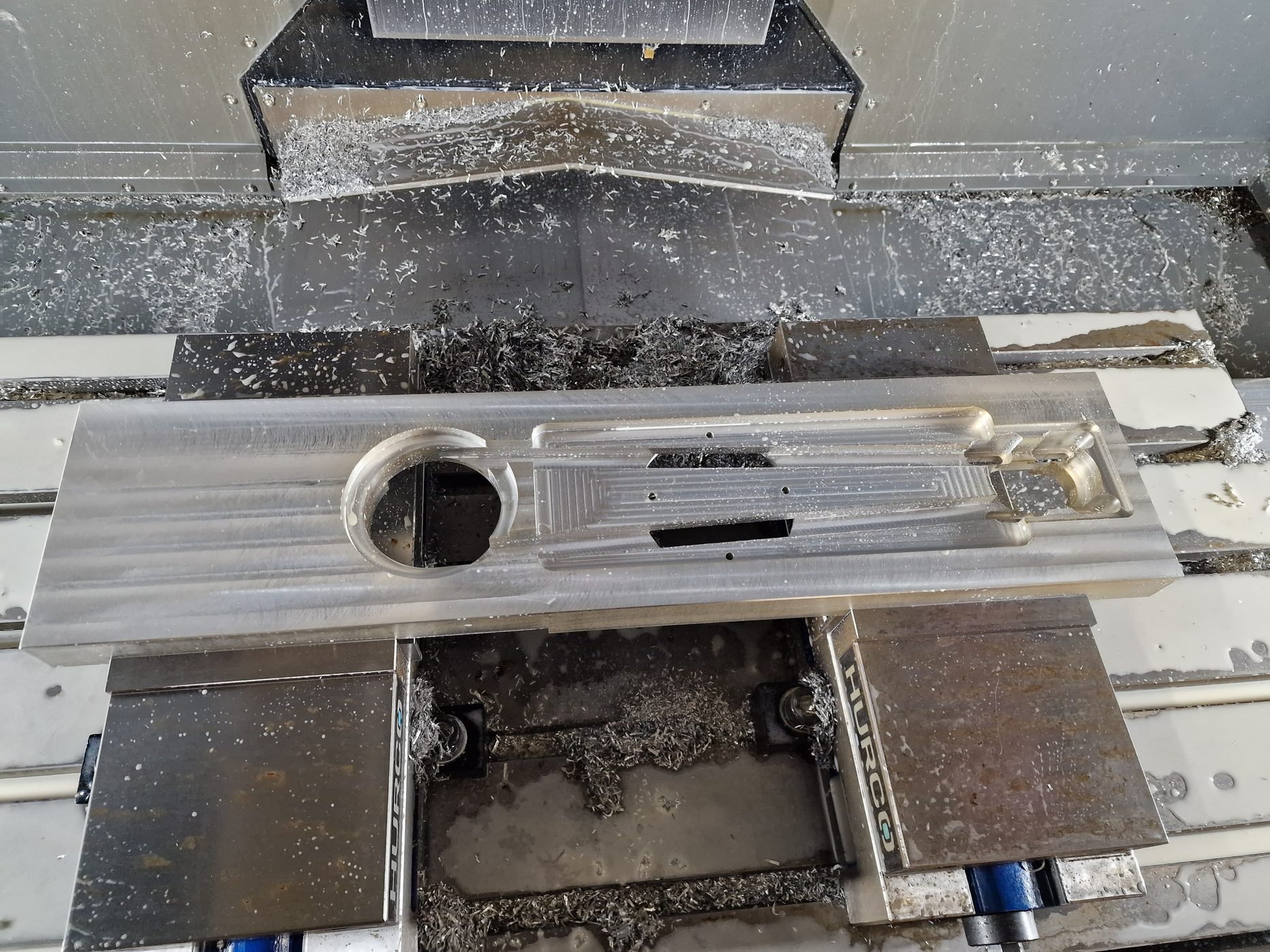 Aluminium component being CNC milled in the AbarTech workshop