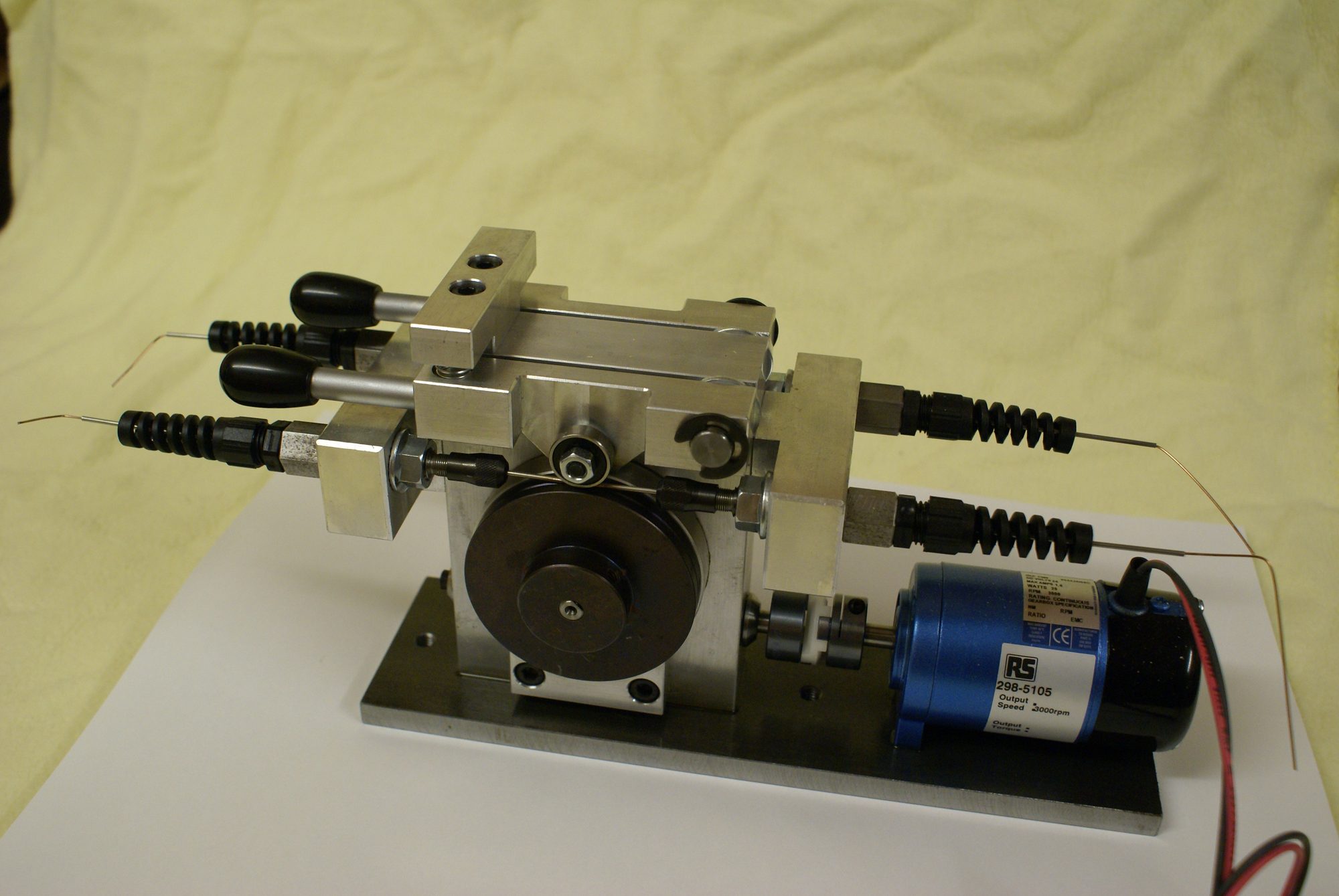 Small bench-mounted wire handling and test mechanism built by AbarTech